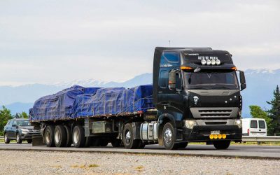 O'Higgins, Chile - November 19, 2015: Black semi-trailer truck CNHTC Sinotruck at the interurban freeway.